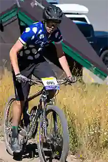 Longmont male rider climbs out of the saddle at Steamboat