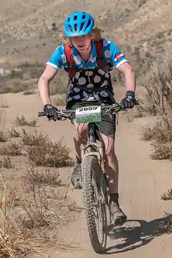 Lyons male athlete rides through the moon like dust at Eagle